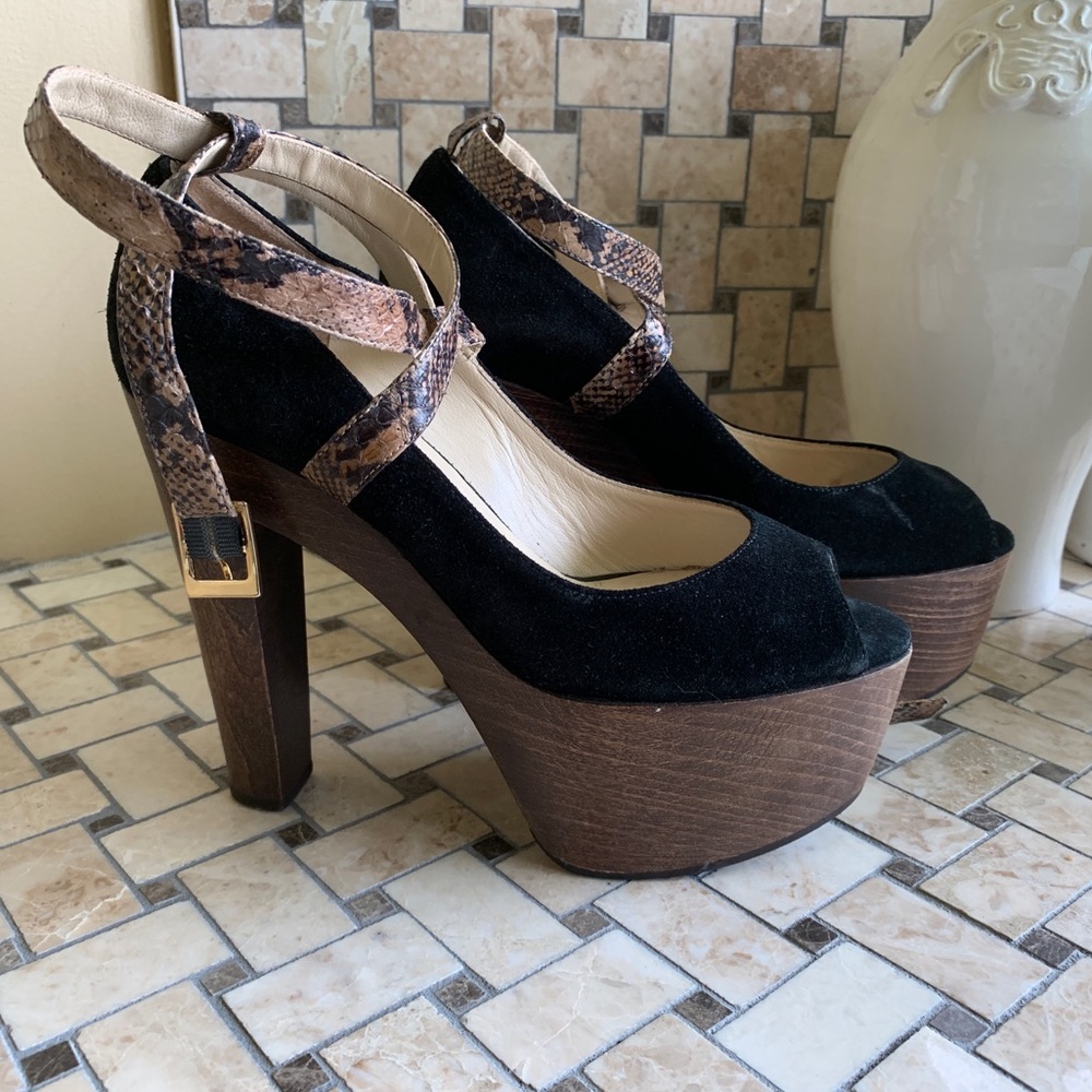 Jimmy Choo platform strap heels.